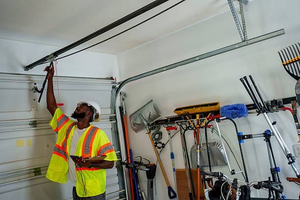 Professional Garage Door Roller Replacement technician working in Bright, IN